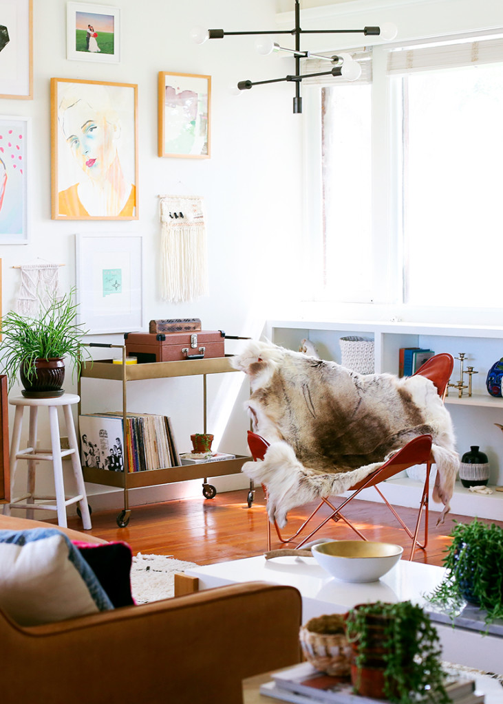 11. Colourful artwork and mismatched furniture give this home a boho feel